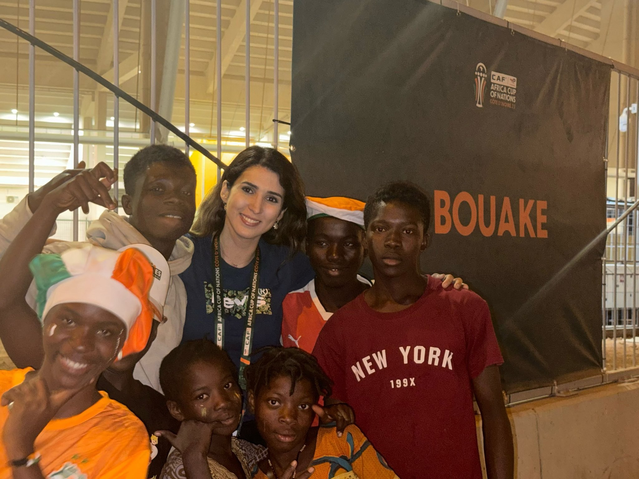 Dounia Mesli — Couverture CAN Côte d'Ivoire 2024, journaliste sportive au stade d'Abidjan